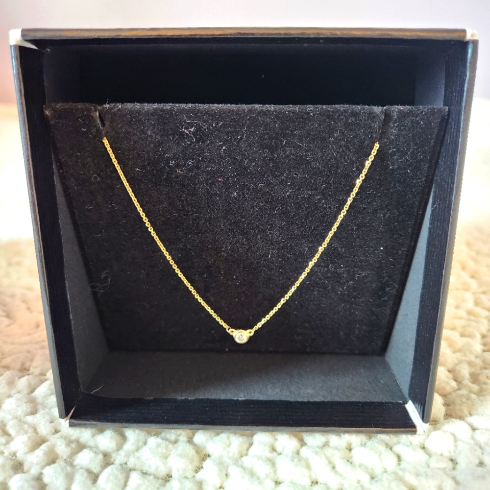 Diamond Bezel Solitare Necklace in 14K Yellow Gold, 0.05 ct. t.w.